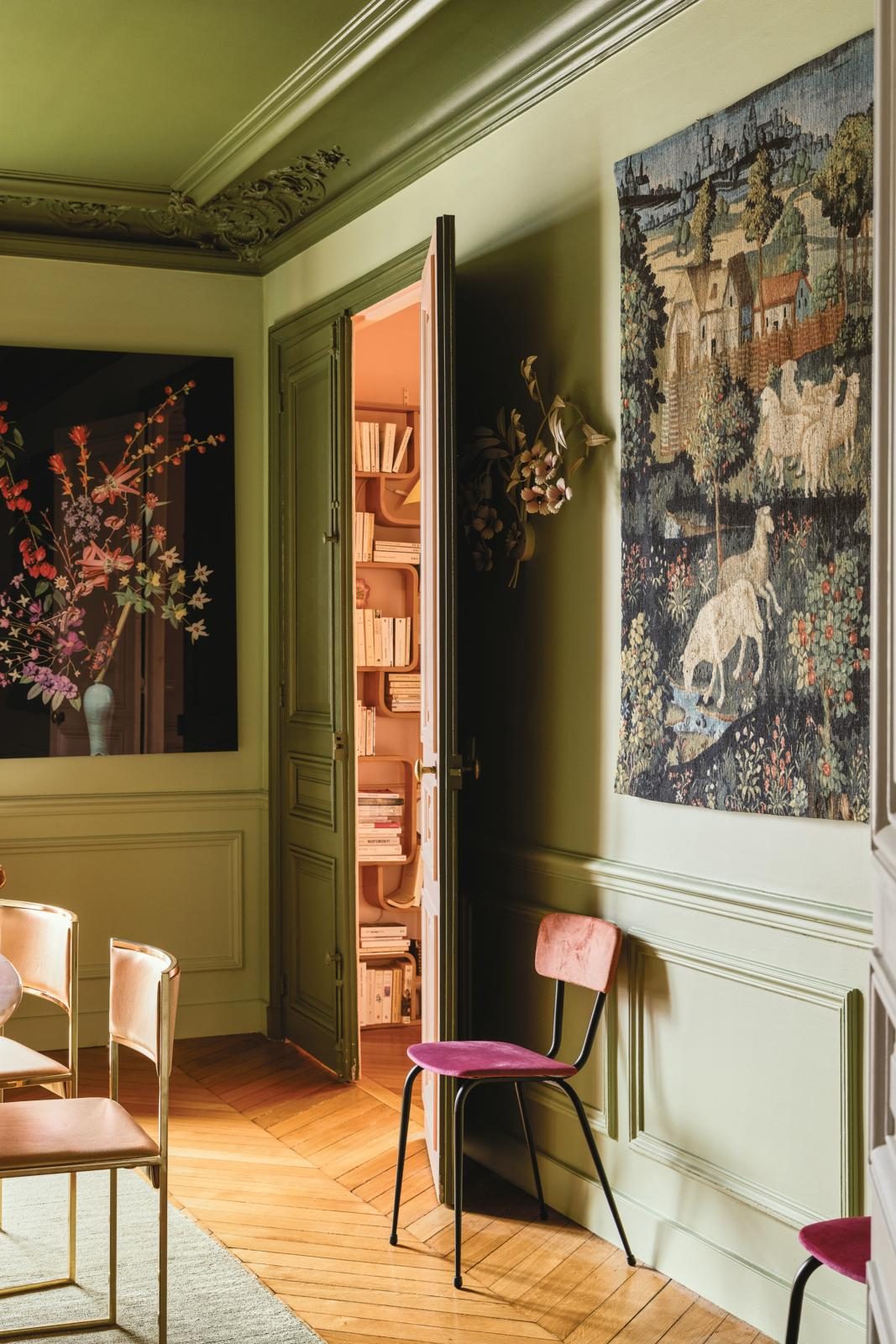 A vintage Aubusson tapestry brings a classic feel to the dining room