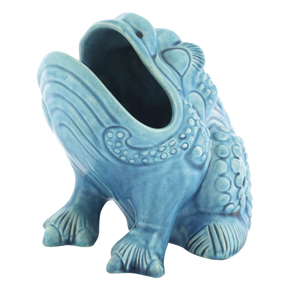 Blue spoon warmer in the shape of a frog