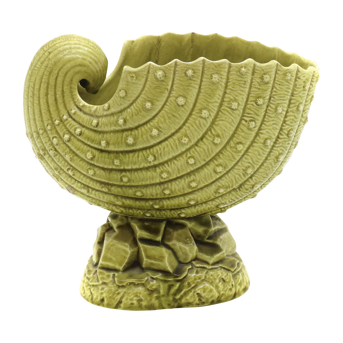 Green ceramic spoon warmer in the shape of a shell